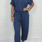 Utility-jumpsuit med korte ermer for kvinner