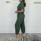 Utility-jumpsuit med korte ermer for kvinner