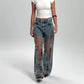 Damejeans med vintage-trykk og mesh-patchwork