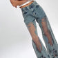 Damejeans med vintage-trykk og mesh-patchwork