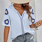 Elegant, brodert blomsterbluse med V-hals for kvinner