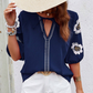 Elegant, brodert blomsterbluse med V-hals for kvinner