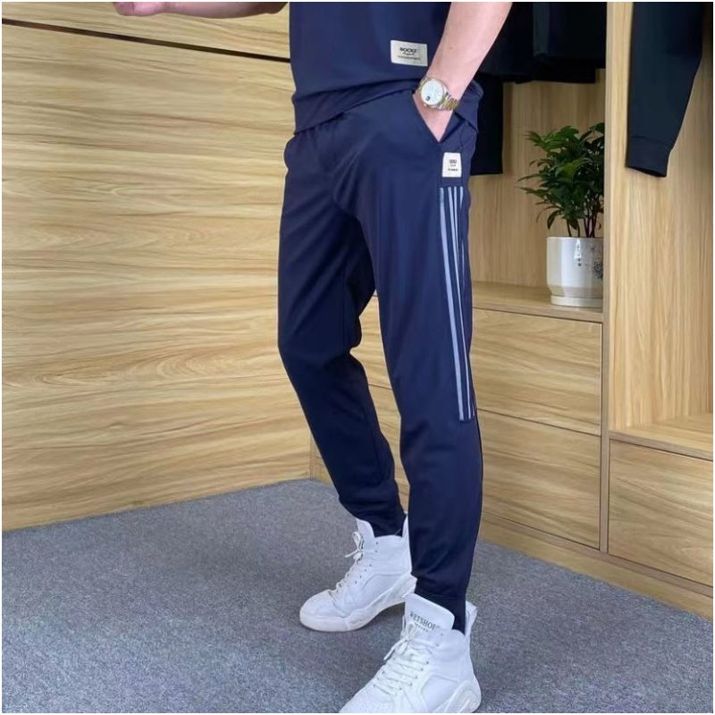 Herresett med høy stretch, kortermet topp og joggebukse med 2 stk.