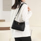 Minimalistisk, romslig skulder- og crossbody-veske i nylon