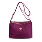 Minimalistisk, romslig skulder- og crossbody-veske i nylon