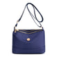 Minimalistisk, romslig skulder- og crossbody-veske i nylon