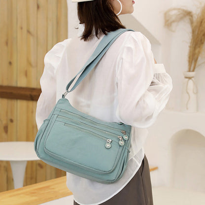💐 50 % RABATT – BLITZTILBUD! Lett nylon-skulderveske med flere lommer – perfekt til reiser og daglig bruk 🎒⚡
