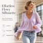 Elegant ensfarget bluse med V-hals for damer