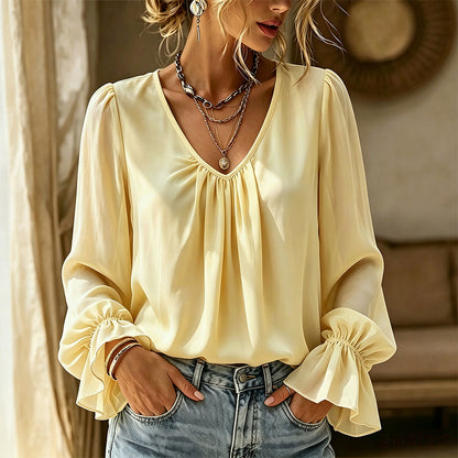 Elegant ensfarget bluse med V-hals for damer
