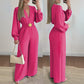 Elegant jumpsuit med V-hals og vide ben, med belte