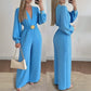 Elegant jumpsuit med V-hals og vide ben, med belte