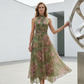 Elegant maxi-kjole med blomstermønster og halterneck