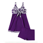 Elegant badekjole med blomstermønster og shorts for damer
