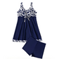 Elegant badekjole med blomstermønster og shorts for damer