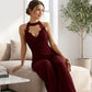 Elegant jumpsuit for kvinner med halterneck, blonder og plissert, vid ben