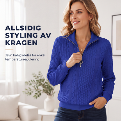 Damegenser med halvt glidelås og kabelstrikk