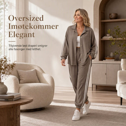 Avslappet todelt loungesett for kvinner med overdimensjonert skjorte med knapper og joggebukser med sidestriper