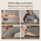 Avslappet todelt loungesett for kvinner med overdimensjonert skjorte med knapper og joggebukser med sidestriper