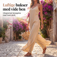 Dames uformell jumpsuit med V-hals og tynne stropper