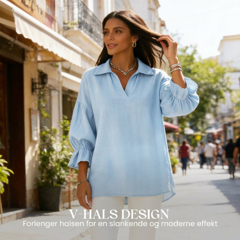 Damebluse med jakkeslag-V-hals og 3/4 lyktermer