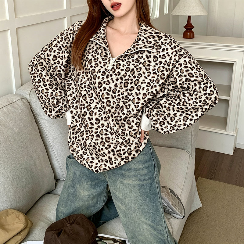 Damegenser med leopardmønstring og kvart glidelås