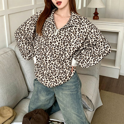 Damegenser med leopardmønstring og kvart glidelås