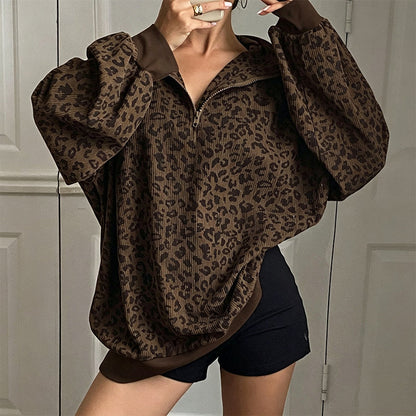 Damegenser med leopardmønstring og kvart glidelås
