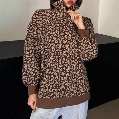 Damegenser med leopardmønstring og kvart glidelås
