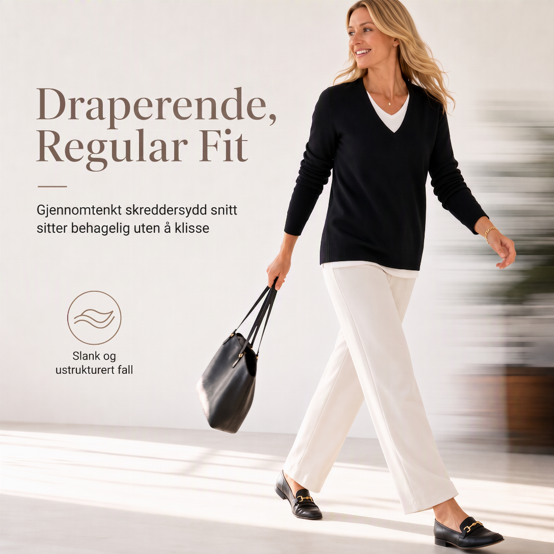 Damelig strikket topp i falsk to-delt design med V-hals